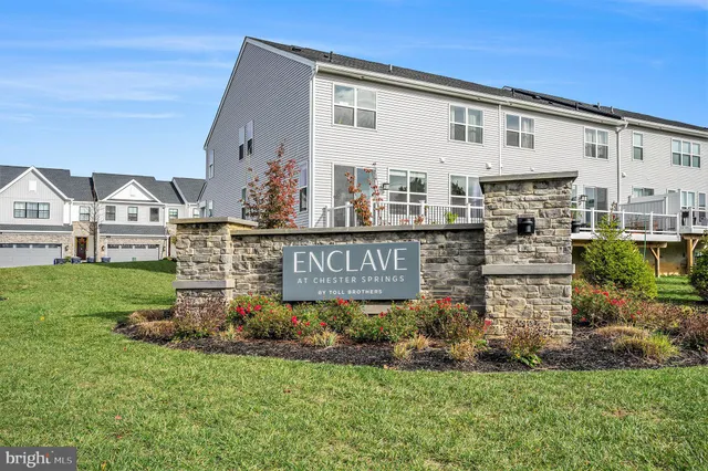 a view of front of house with a yard