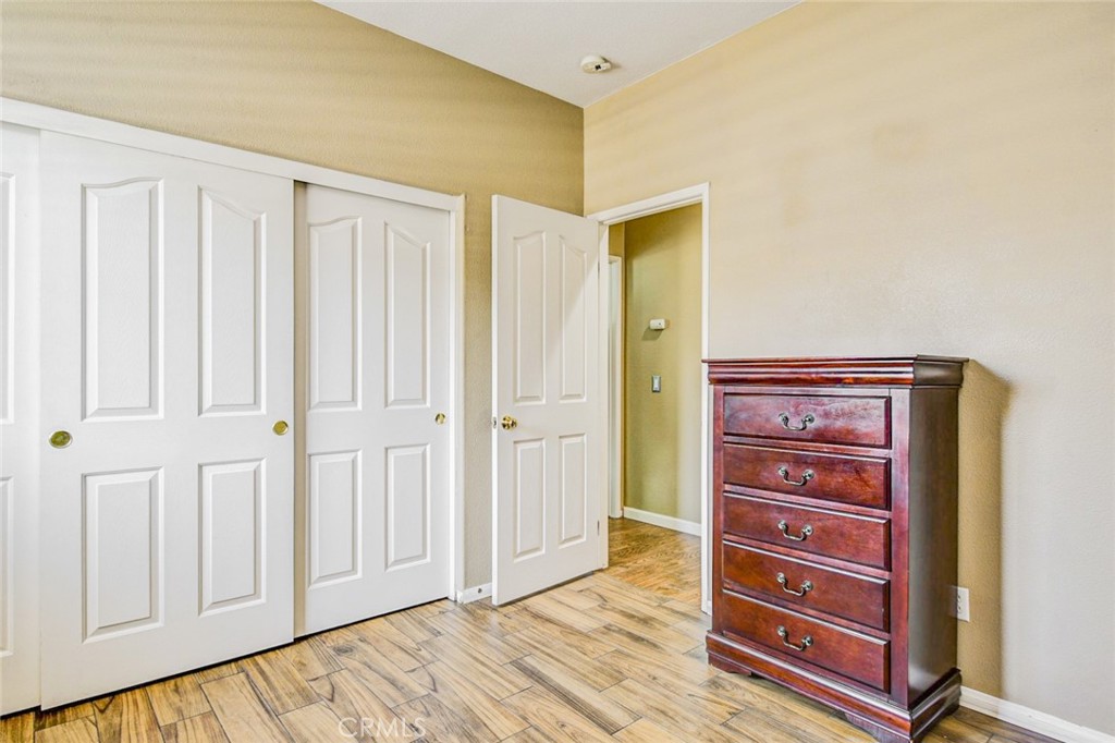 6174 Risingstar Drive Eastvale, CA 92880 - Photo 32 of 57 a view of closet area