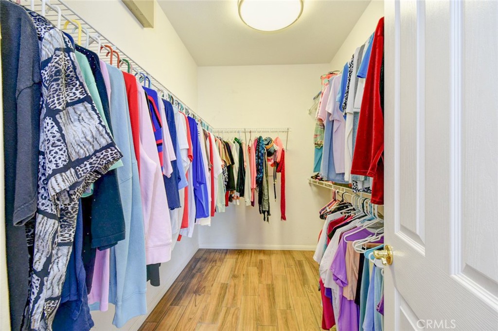 6174 Risingstar Drive Eastvale, CA 92880 - Photo 35 of 57 a view of a walk in closet