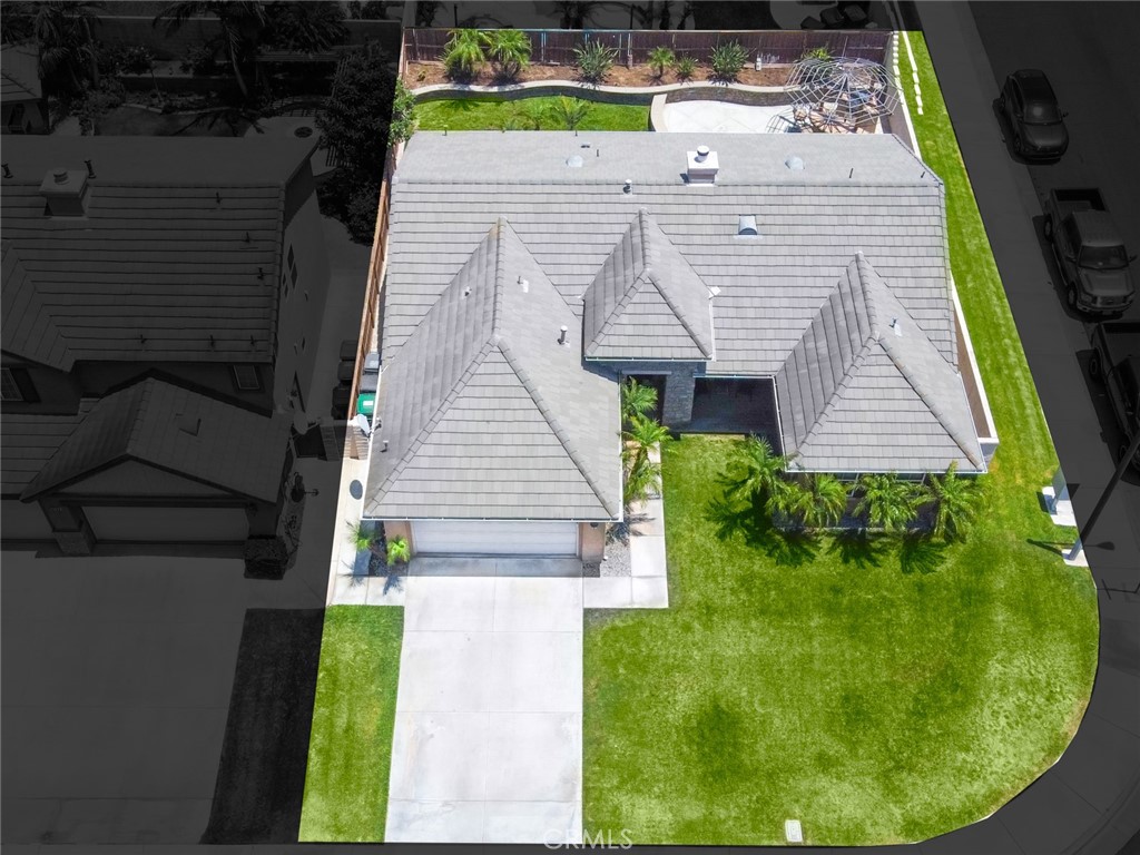 6174 Risingstar Drive Eastvale, CA 92880 - Photo 51 of 57 a view of a backyard with plants