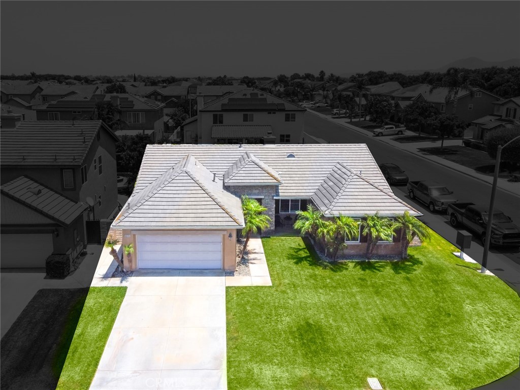 6174 Risingstar Drive Eastvale, CA 92880 - Photo 52 of 57 a aerial view of a house with garden space