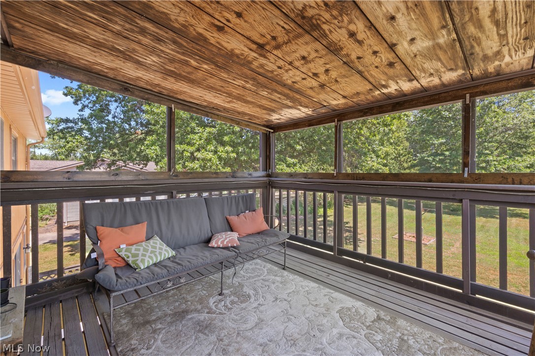 2565 Abbe Road North Sheffield Lake, OH 44054 - Photo 20 of 32 Covered balcony with screened enclosure
