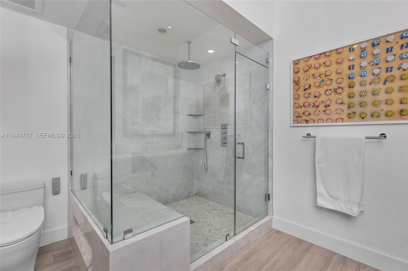 3222 Matilda Street, Unit 3222 Miami, FL 33133 - Photo 33 of 70 a bathroom with a shower and a toilet