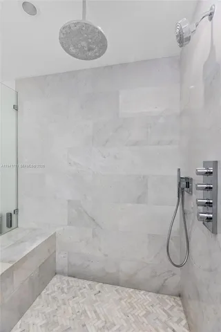 a outdoor living space with furniture and a rug