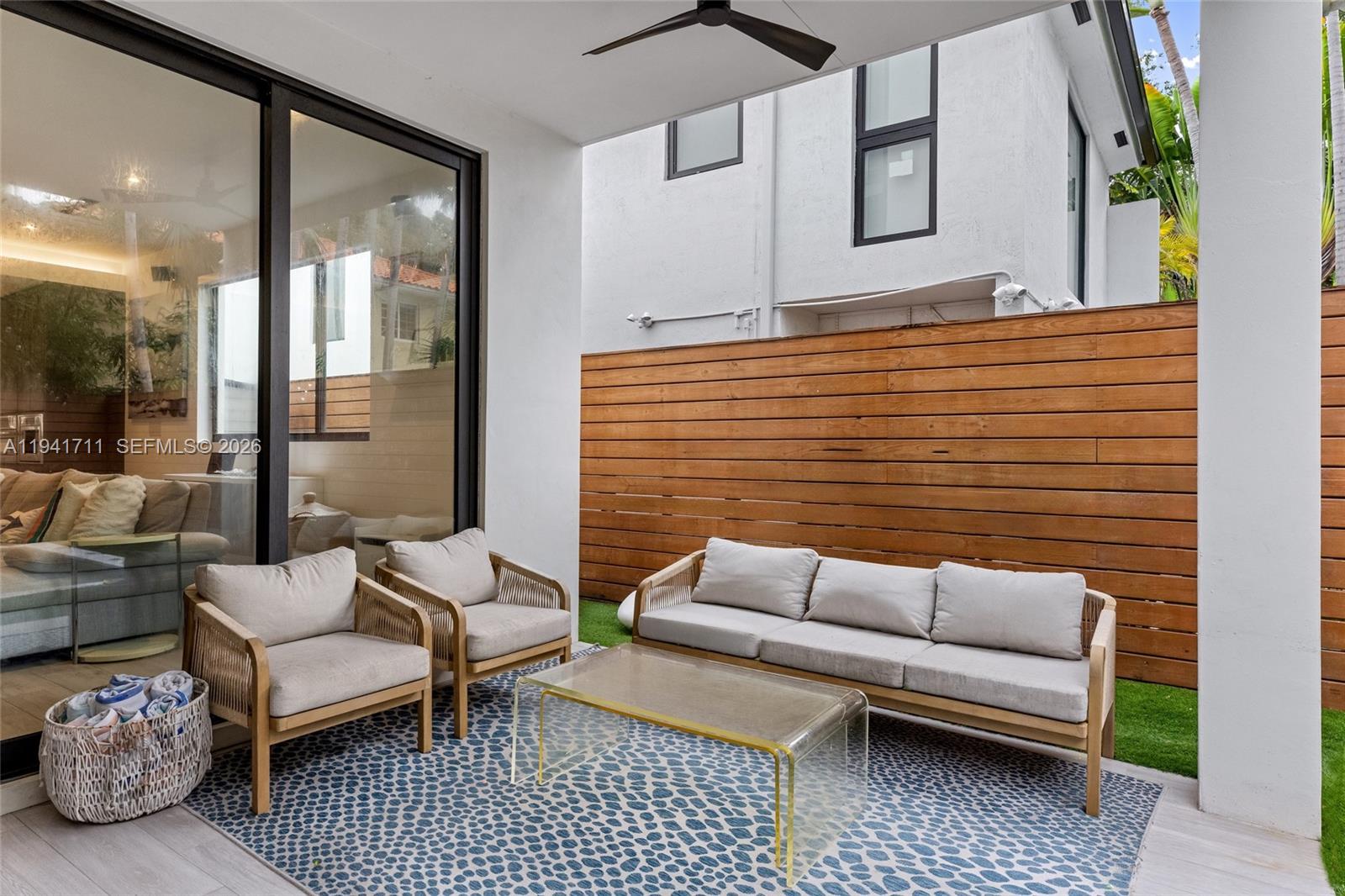 3222 Matilda Street, Unit 3222 Miami, FL 33133 - Photo 47 of 70 a outdoor living space with furniture and a rug