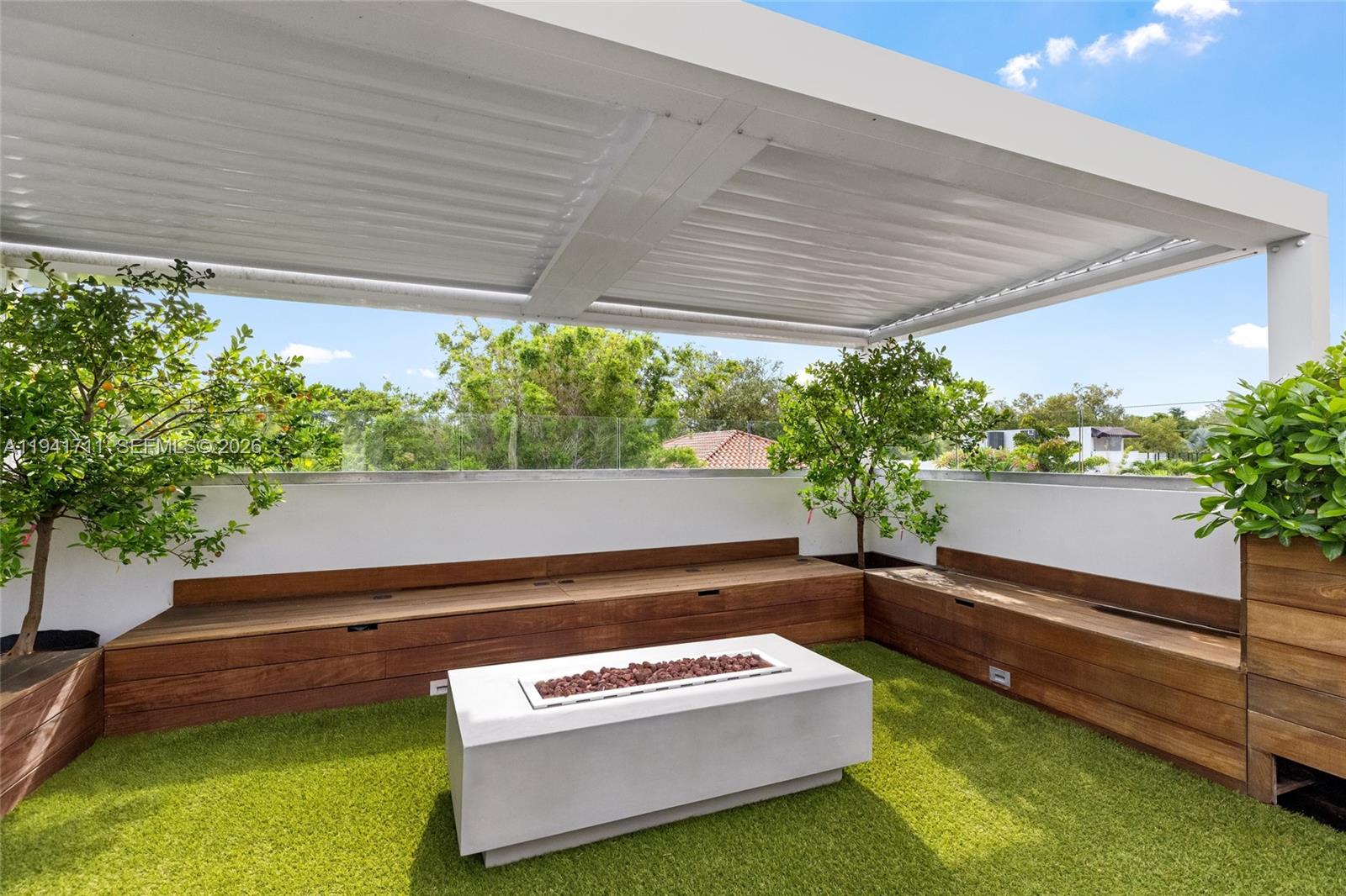3222 Matilda Street, Unit 3222 Miami, FL 33133 - Photo 58 of 70 a view of a two chairs in the patio
