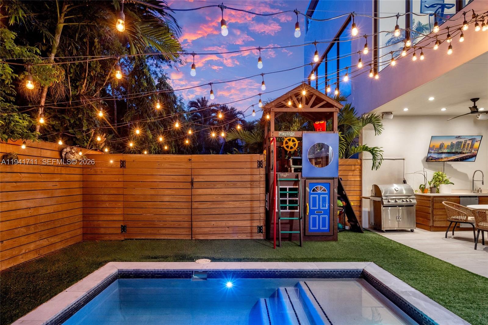 3222 Matilda Street, Unit 3222 Miami, FL 33133 - Photo 65 of 70 a front view of a house with a yard