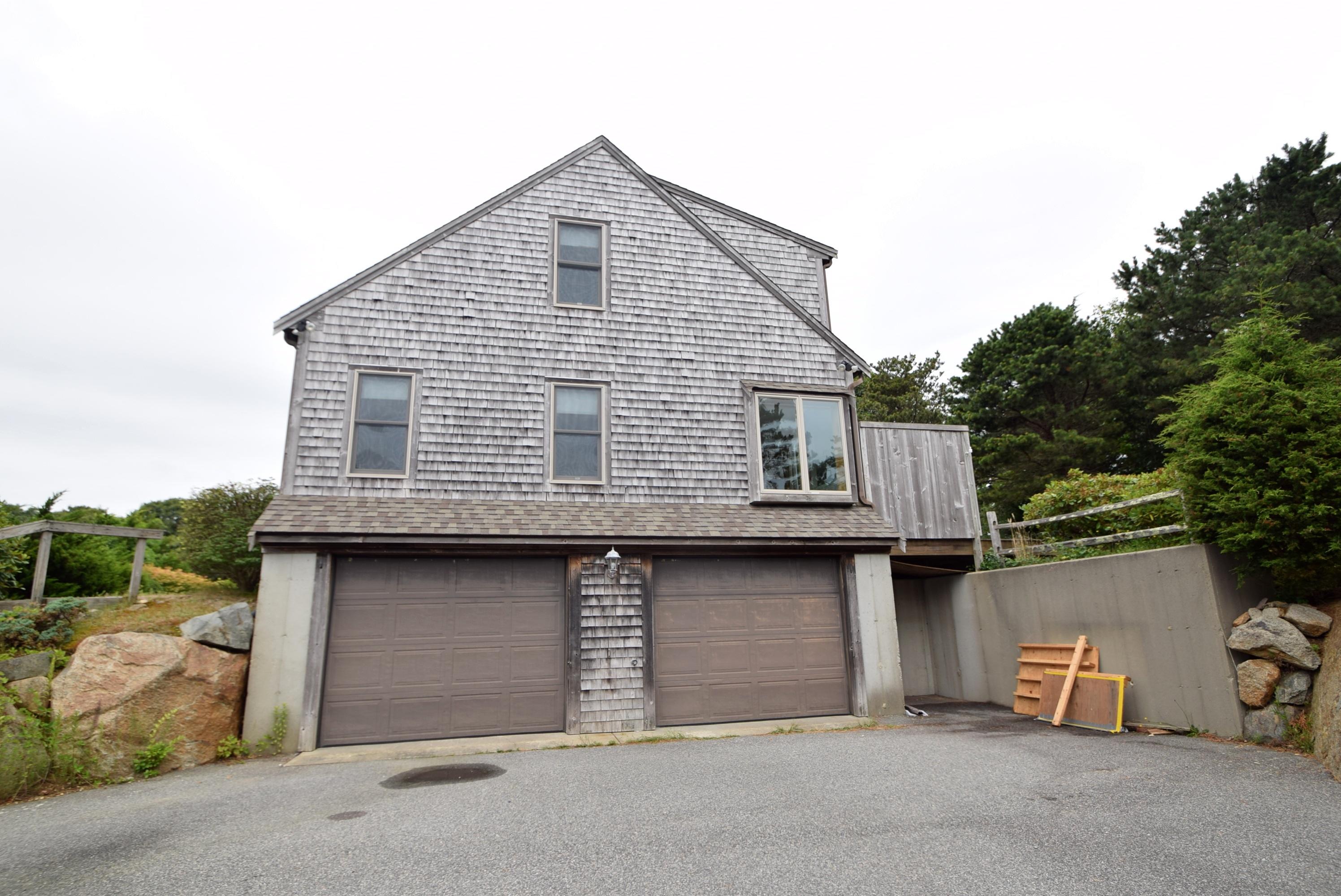 117 Griffiths Pond Road Brewster, MA 02631 - Photo 31 of 34 117Griffiths GarageSide
