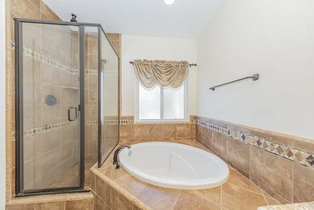 a view of a livingroom with furniture and front door