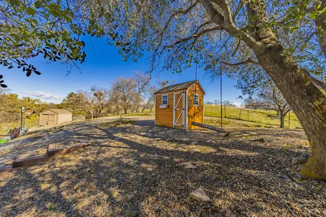 a kitchen with stainless steel appliances granite countertop a sink stove and microwave