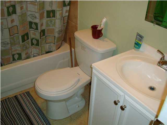 179 13th Street Santa Rosa Beach, FL 32459 - Photo 15 of 21 a bathroom with a sink and toilet