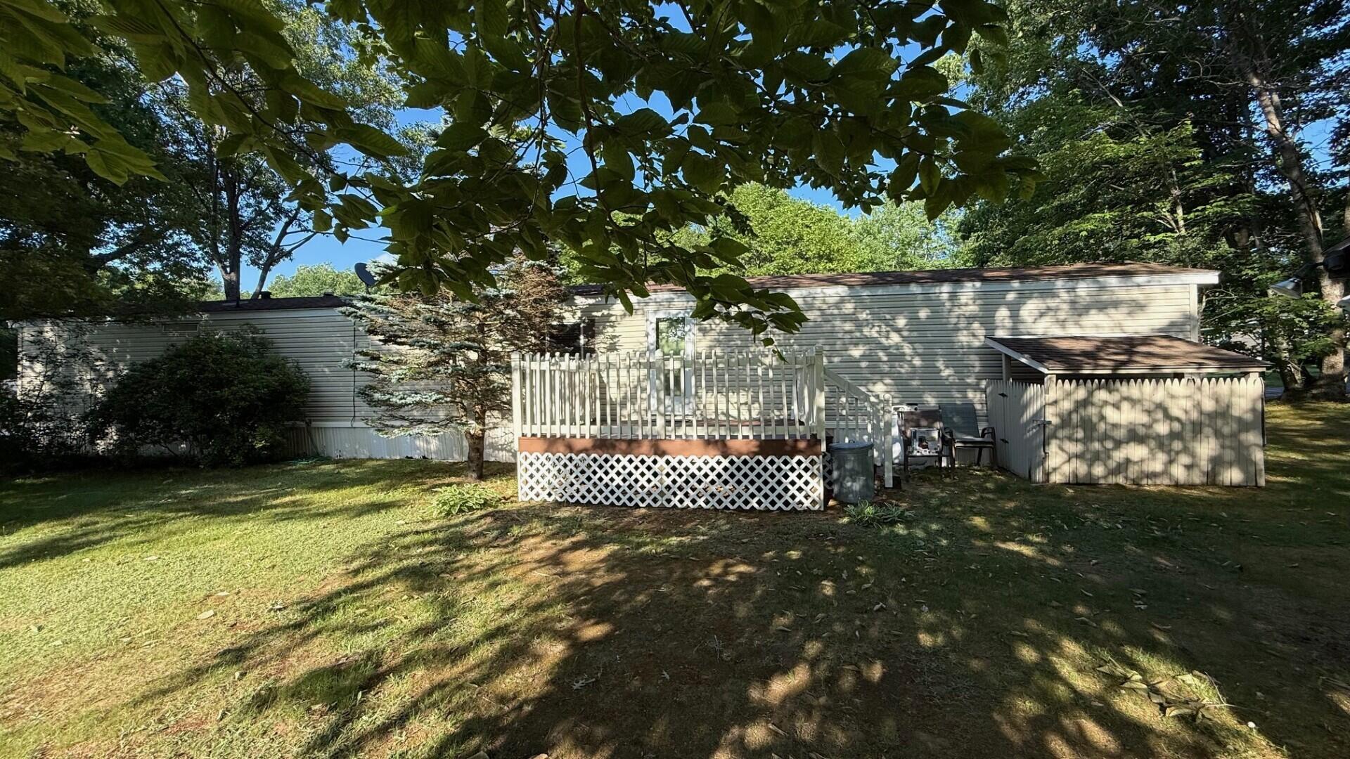 3 Sunset Lane Turner, ME 04282 - Photo 21 of 28 Rear view with deck