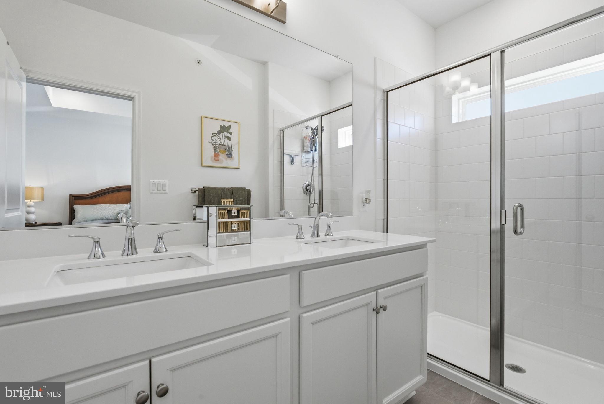 761 Elevation Road Frederick, MD 21702 - Photo 24 of 46 Sleek modern bathroom with natural light.