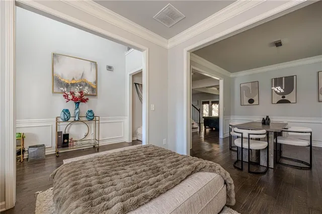 a view of a livingroom with furniture and wooden floor
