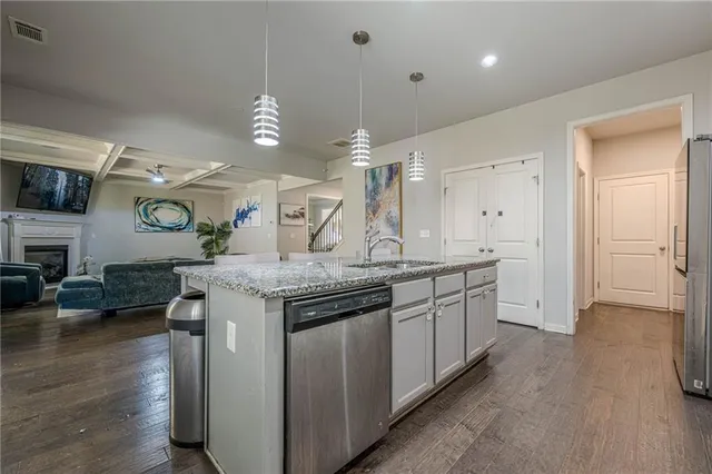 a spacious bedroom with a bed and a window