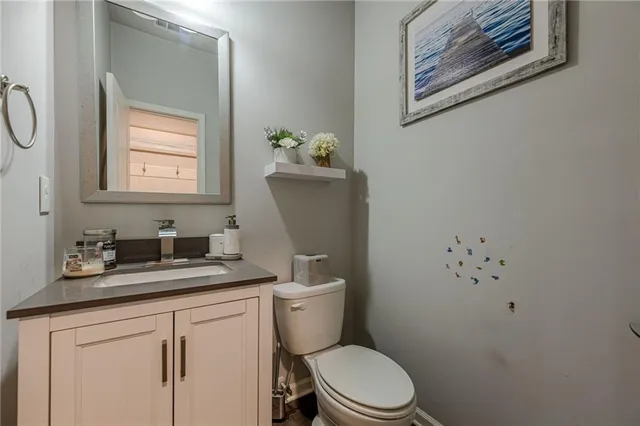 a bedroom with a large bed and a walk in closet