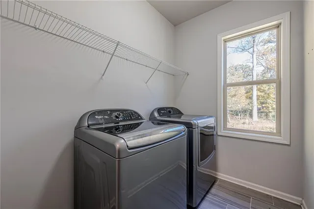 a view of a hallway with windows