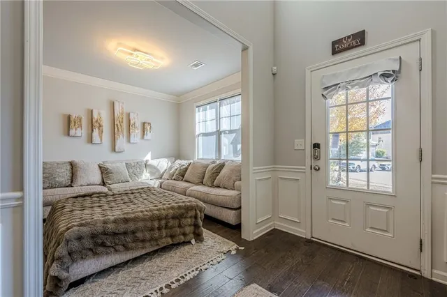 a living room with furniture and a couch