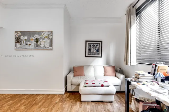 a living room with furniture and window