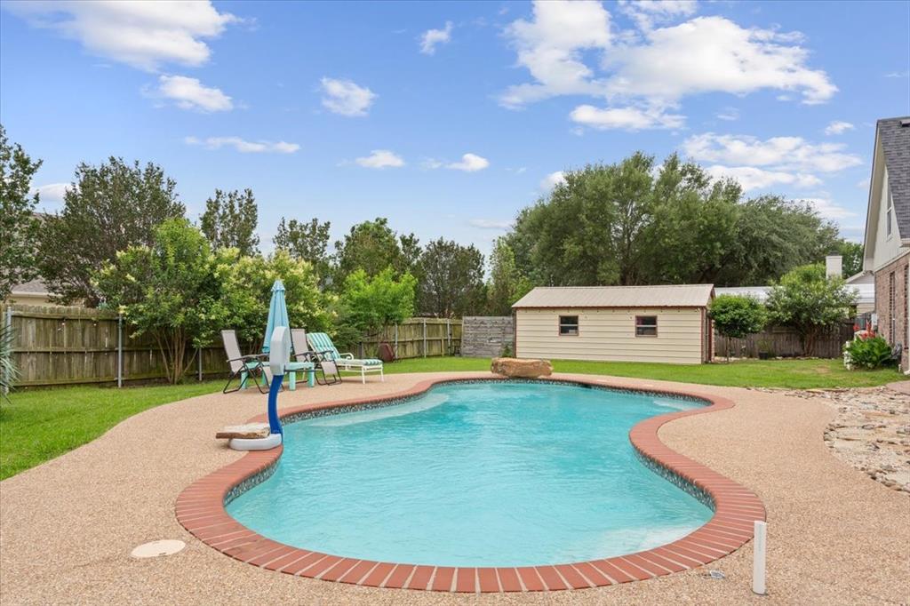 5616 Landsdown Drive Waco, TX 76708 - Photo 30 of 33 a view of a house with swimming pool