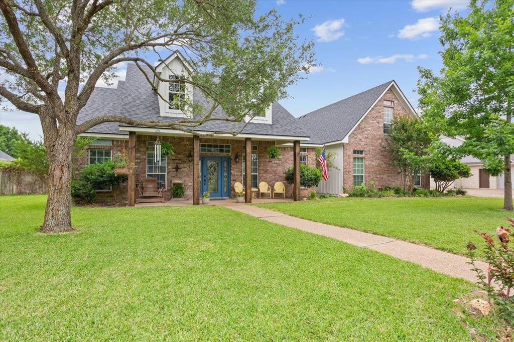 5616 Landsdown Drive Waco, TX 76708 - Photo 3 of 33 front view of a house with a yard