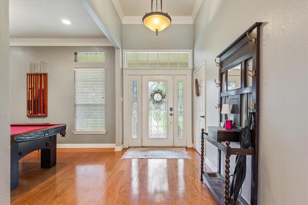 5616 Landsdown Drive Waco, TX 76708 - Photo 4 of 33 a view of an entryway with wooden floor