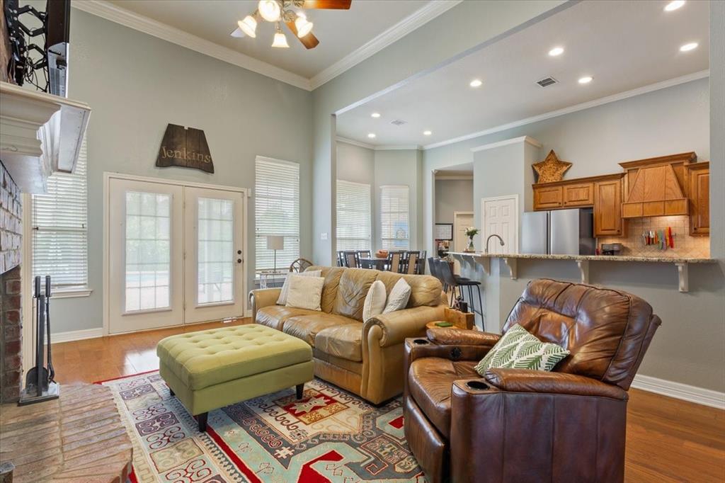 5616 Landsdown Drive Waco, TX 76708 - Photo 9 of 33 a living room with furniture and a large window