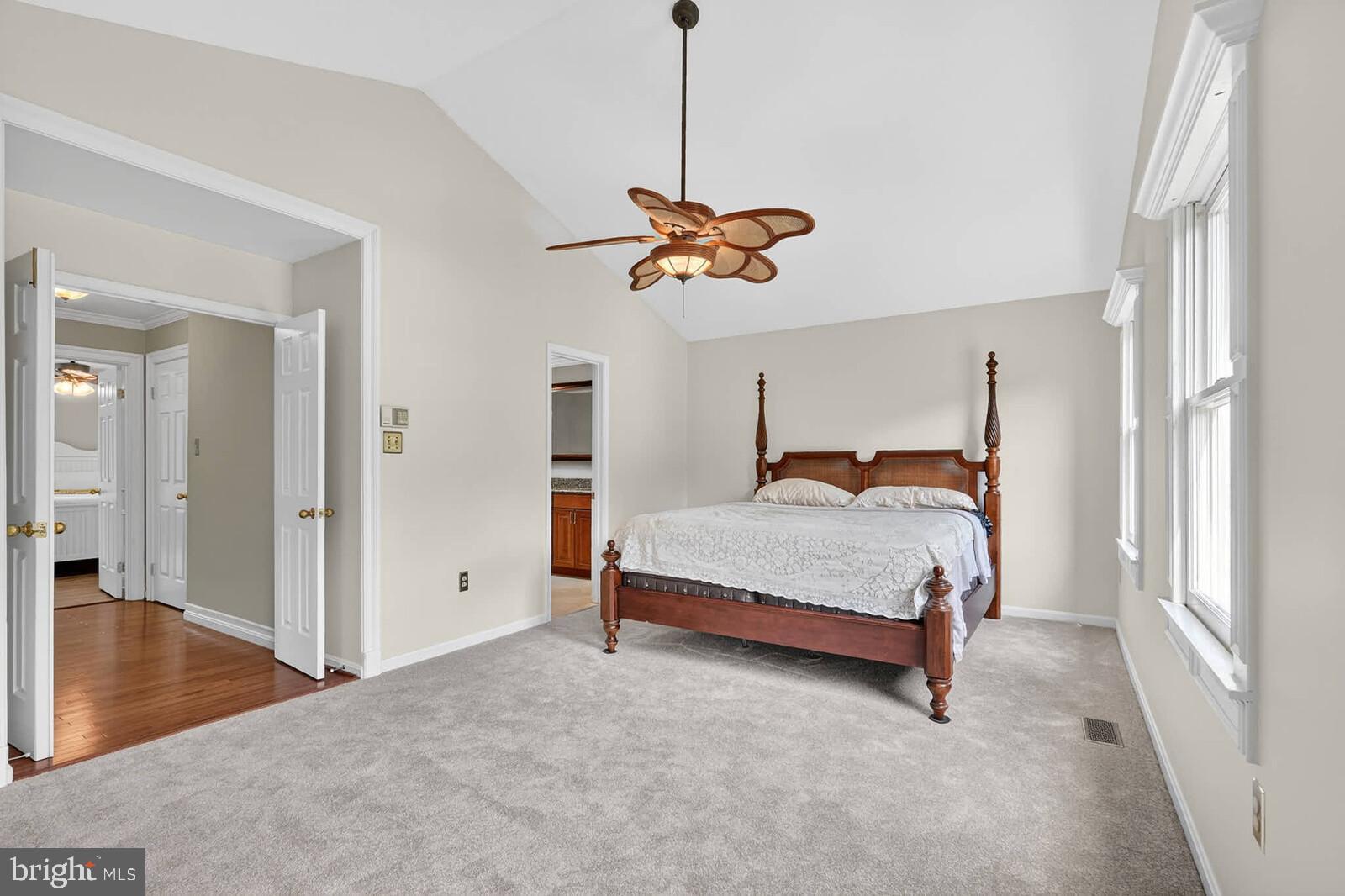 2108 Merrifields Drive Silver Spring, MD 20906 - Photo 25 of 69 a bedroom with a bed and a chandelier