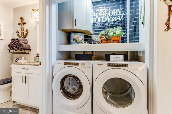 a bathroom with glass shower