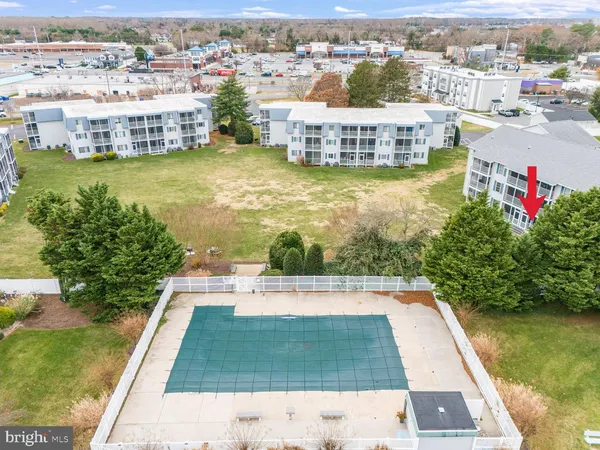 a view of swimming pool from a balcony