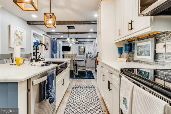 a bathroom with a bathtub and a sink