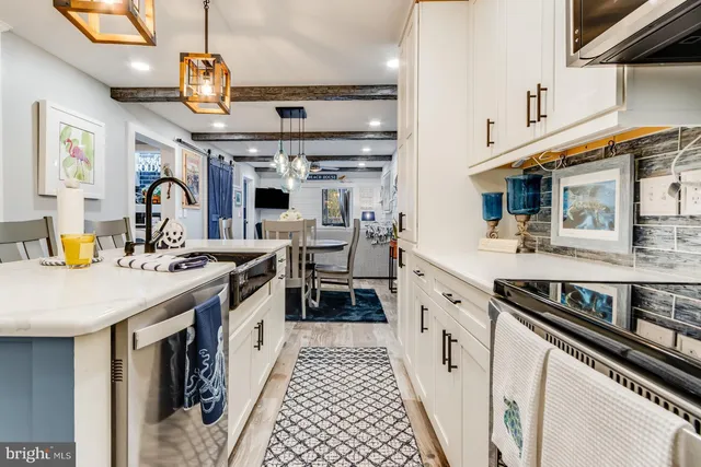 a bathroom with a bathtub and a sink