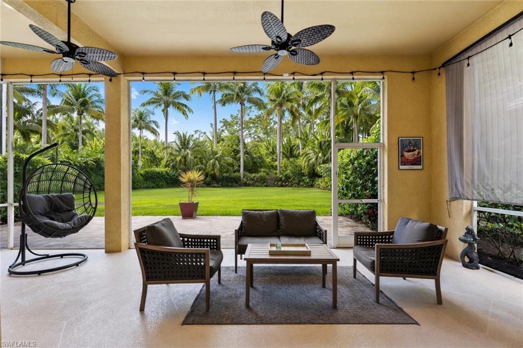 6051 Shallows Way Naples, FL 34109 - Photo 3 of 38 a building outdoor space with patio furniture