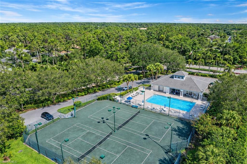 6051 Shallows Way Naples, FL 34109 - Photo 34 of 38 an aerial view of a house with a yard