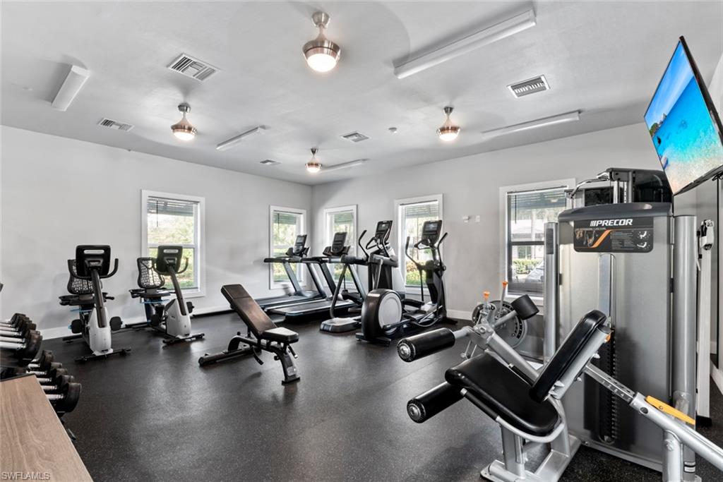 6051 Shallows Way Naples, FL 34109 - Photo 35 of 38 a view of a room with gym equipment