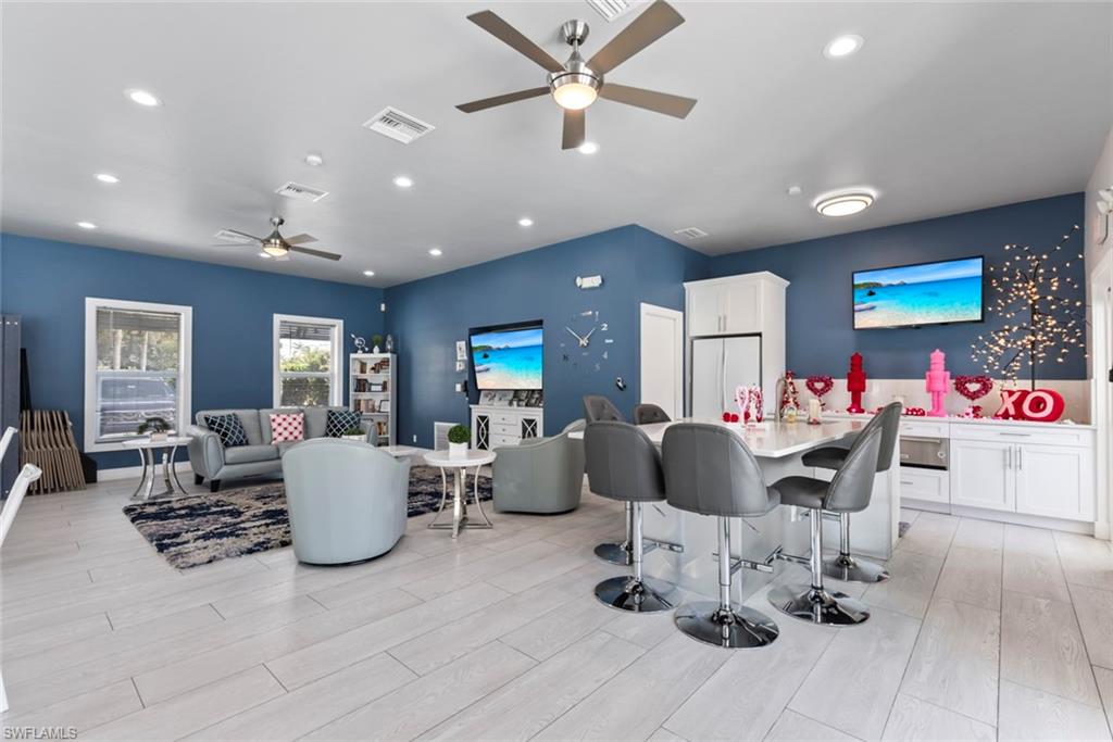 6051 Shallows Way Naples, FL 34109 - Photo 36 of 38 a living room with furniture