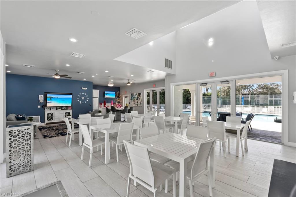 6051 Shallows Way Naples, FL 34109 - Photo 38 of 38 a view of a dining area with furniture window and outside view