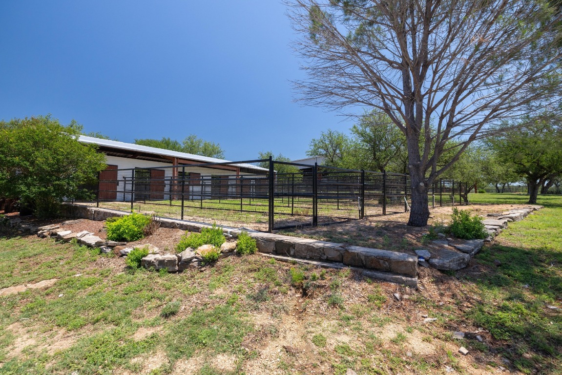 3307 Sunset Cliff Road Burnet, TX 78611 - Photo 12 of 23 a view of a house with backyard and sitting area