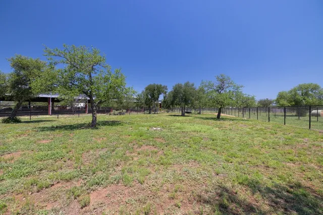 a view of outdoor space with deck and yard