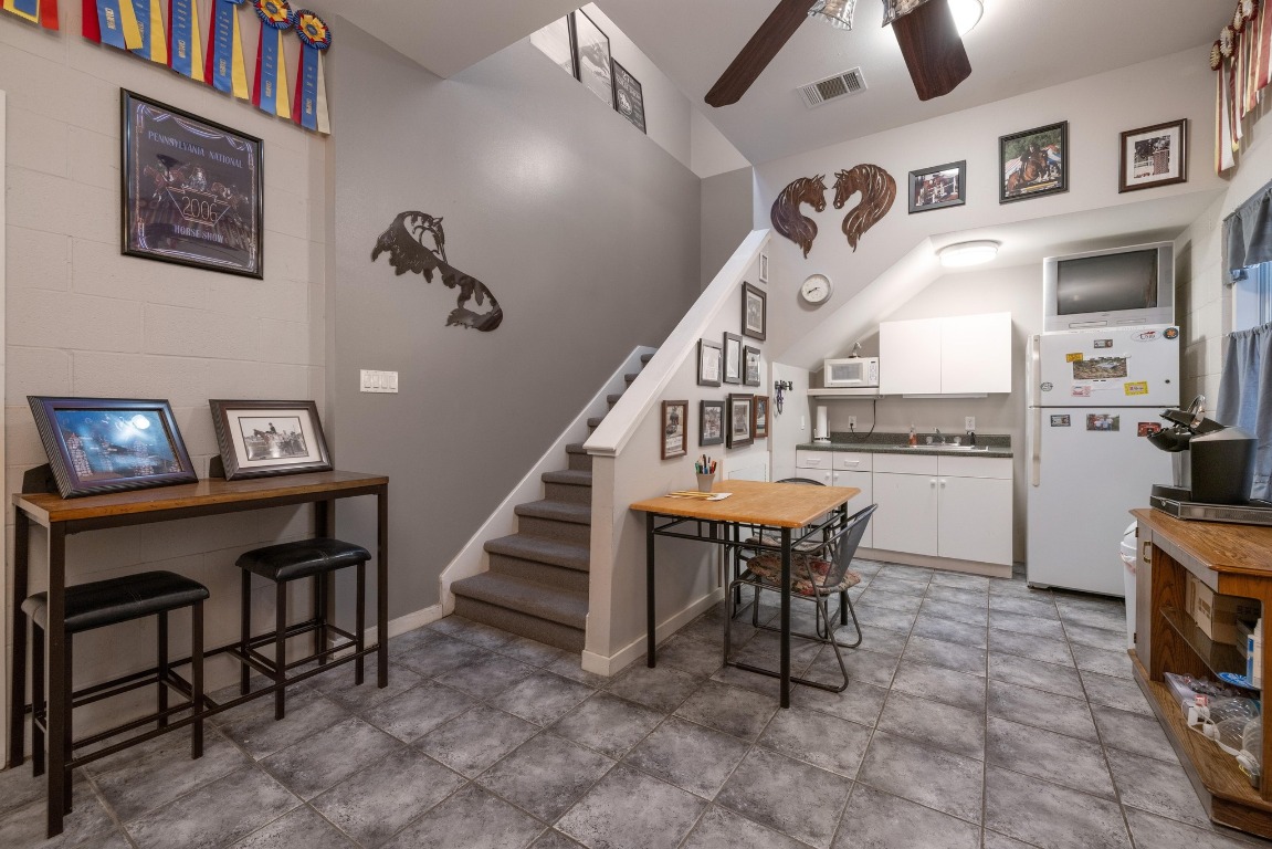 3307 Sunset Cliff Road Burnet, TX 78611 - Photo 7 of 23 a dining room with furniture and wooden floor