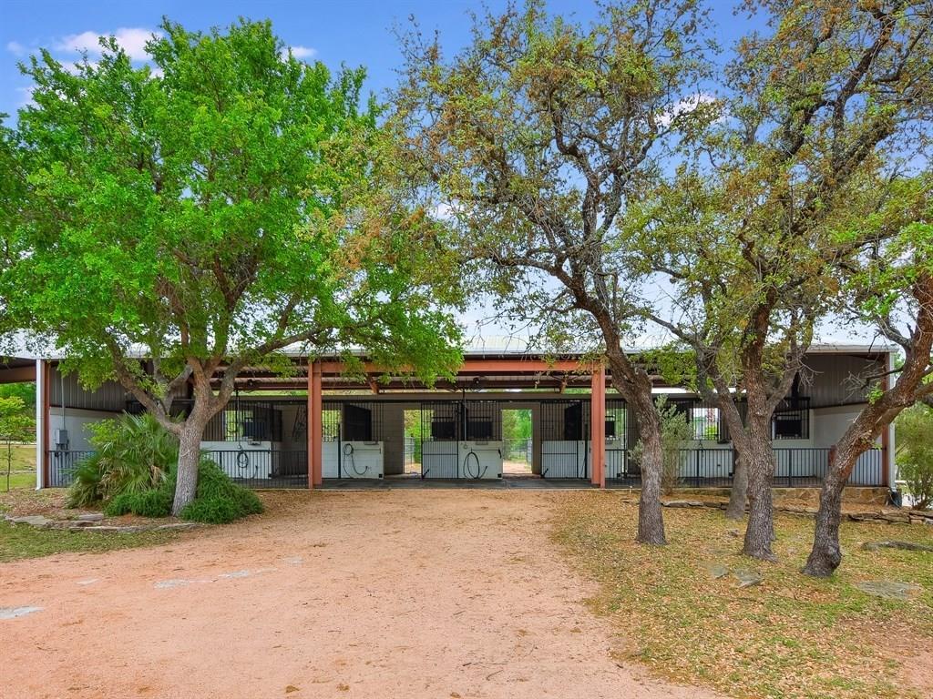 3307 Sunset Cliff Road Burnet, TX 78611 - Photo 10 of 23 a view of a house with a backyard