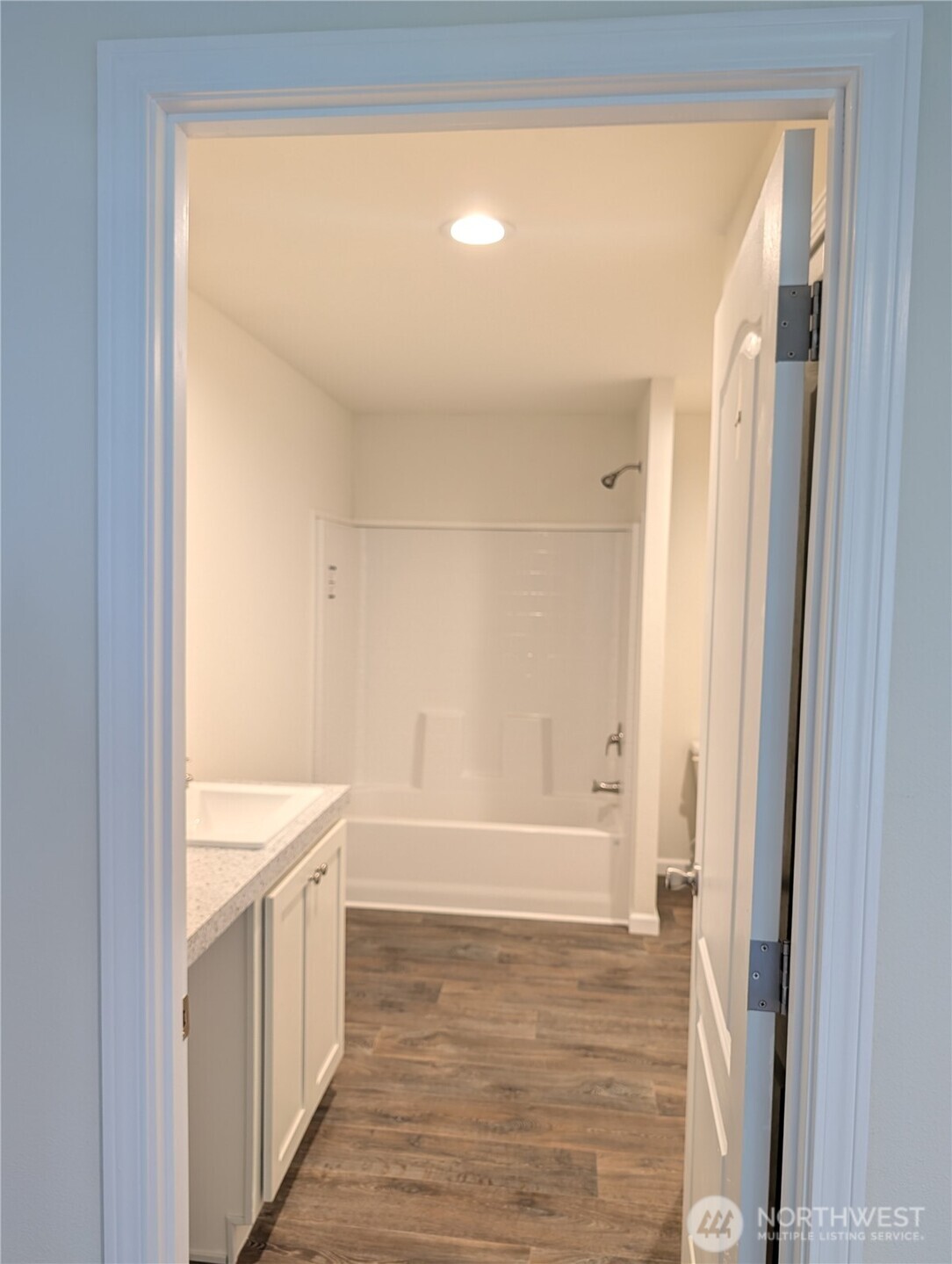 4000 Flynn Street, Unit 33 Bellingham, WA 98229 - Photo 12 of 15 a bathroom with a bathtub and a shower