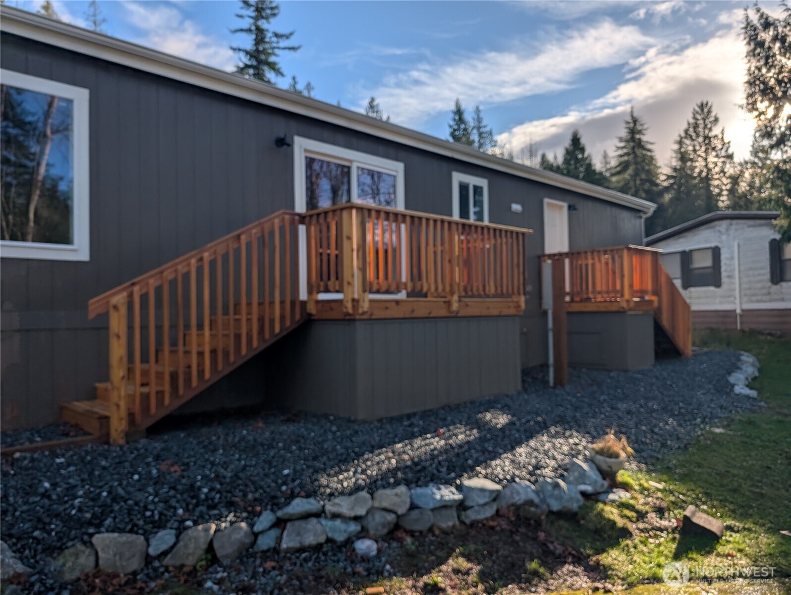 4000 Flynn Street, Unit 33 Bellingham, WA 98229 - Photo 2 of 15 a view of a house with a yard deck and a patio