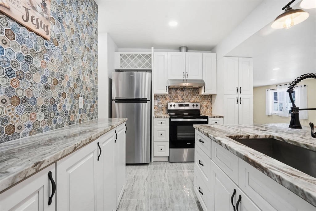 288 Buck Pond Road Westfield, MA 01085 - Photo 27 of 38 a kitchen with a refrigerator and a sink