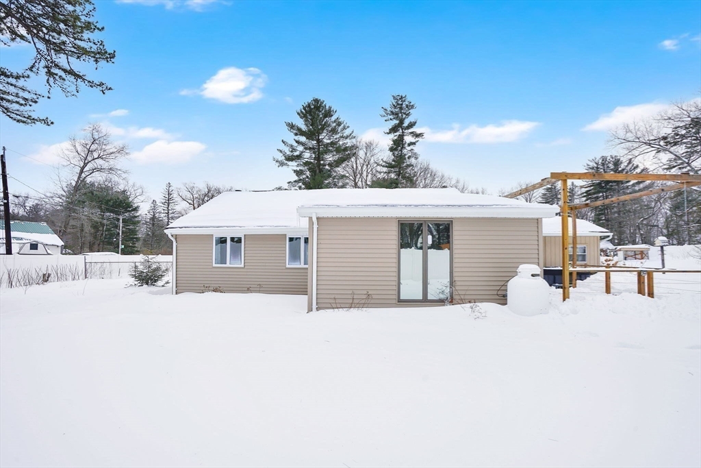 288 Buck Pond Road Westfield, MA 01085 - Photo 35 of 38 a view of a house with a snow in the background