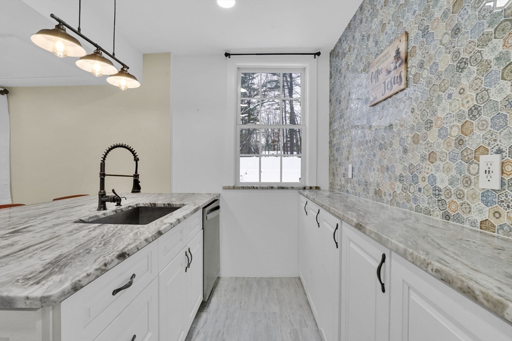 288 Buck Pond Road Westfield, MA 01085 - Photo 4 of 38 a kitchen with a sink and a window
