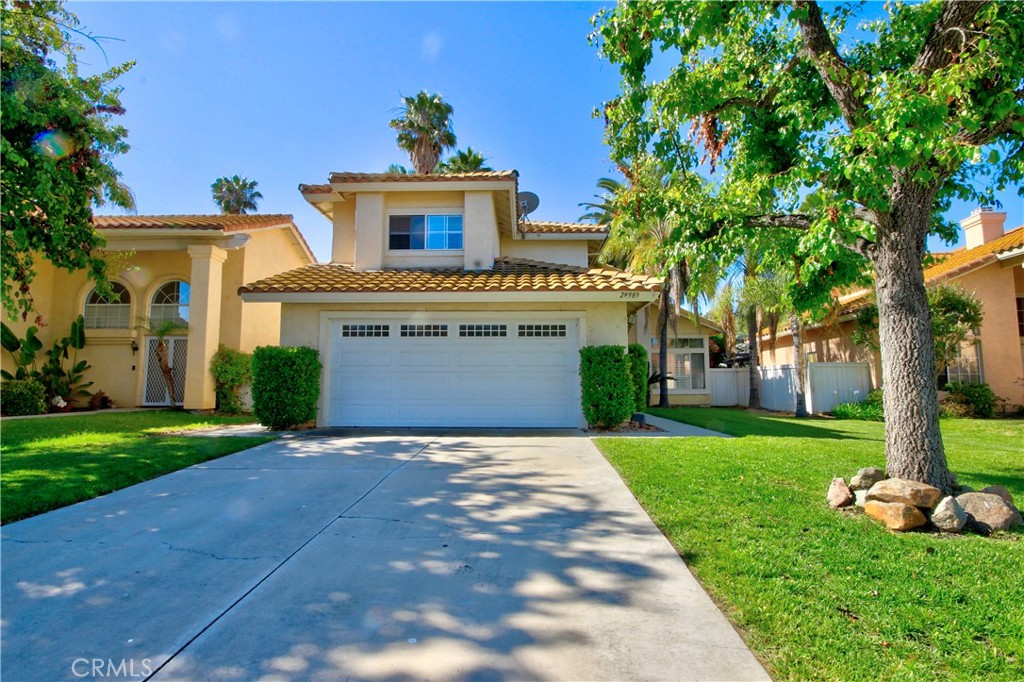 29989 Jon Christian Place Temecula, CA 92591 - Photo 1 of 1 a front view of a house with garden