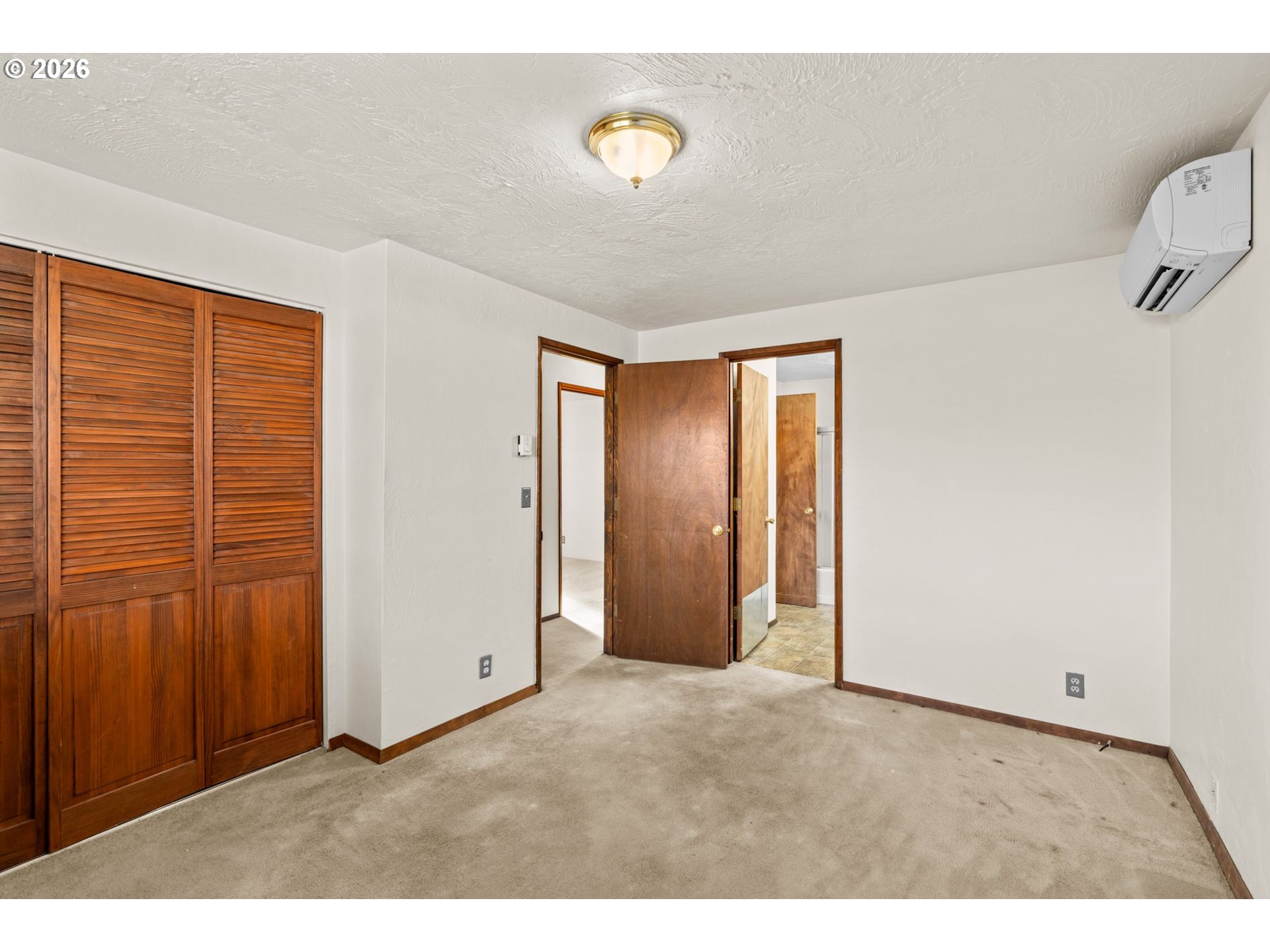 1625 South Bertelsen Road Eugene, OR 97402 - Photo 20 of 34 a view of an empty room with a window
