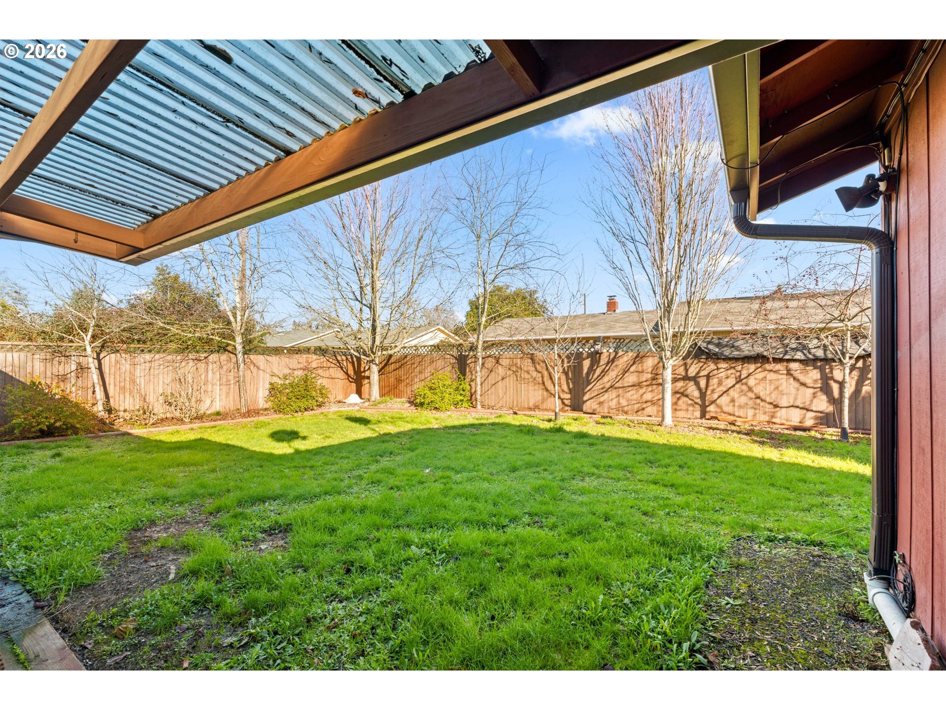 1625 South Bertelsen Road Eugene, OR 97402 - Photo 23 of 34 a view of a backyard with potted plants