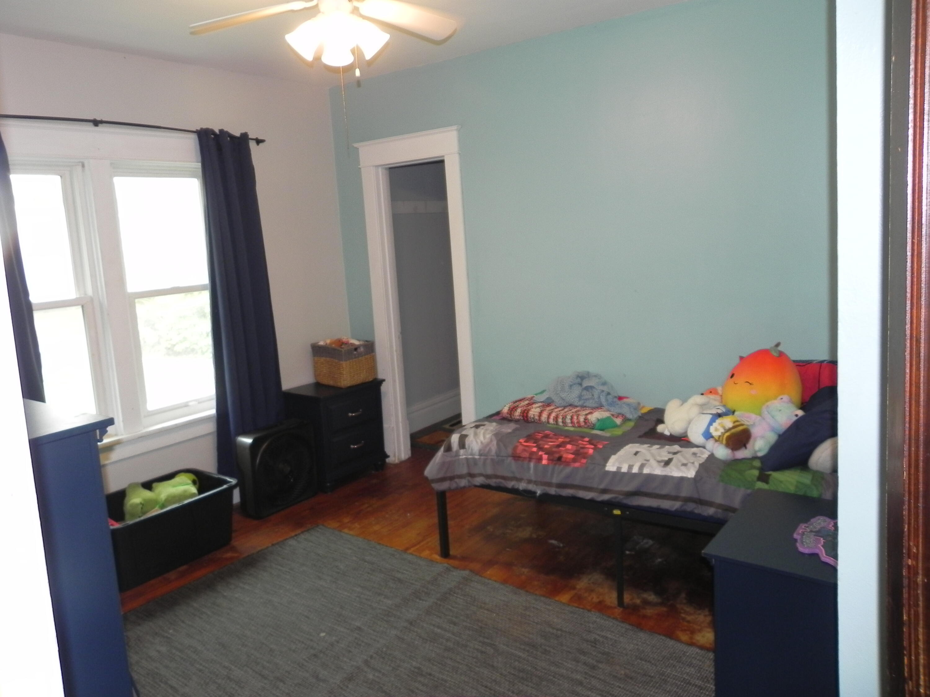 669 Main Street Belgium, WI 53004 - Photo 9 of 35 1st fl bdrm